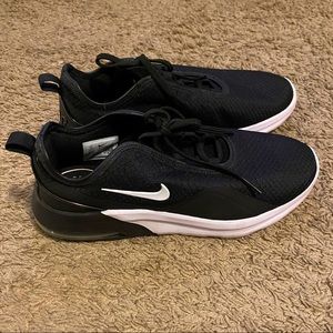 Women’s black Nike Sneakers.